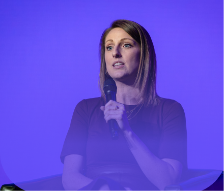 Panelist speaking into a microphone