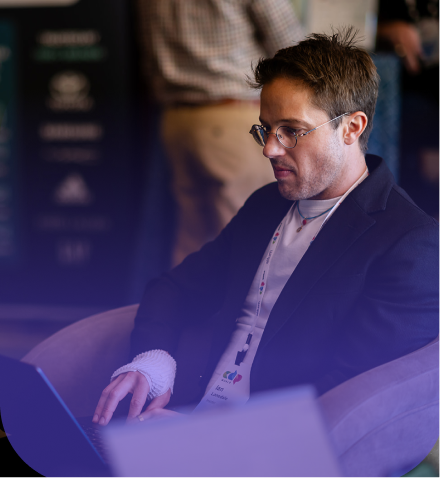 Attendee working at a session